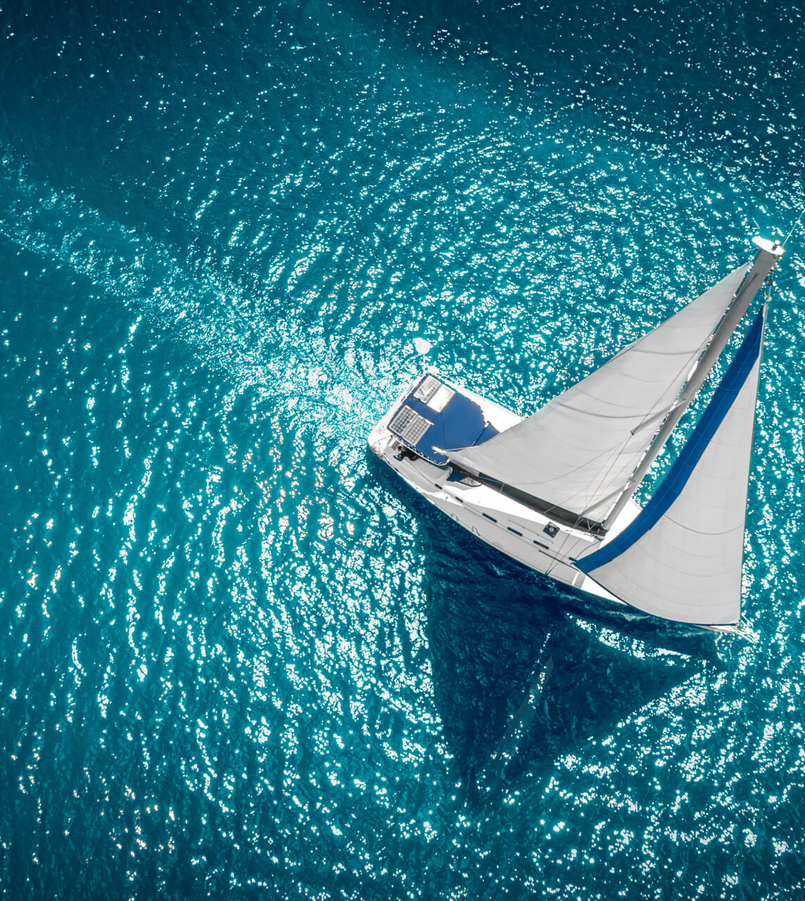 Boat Gliding in Blue Water