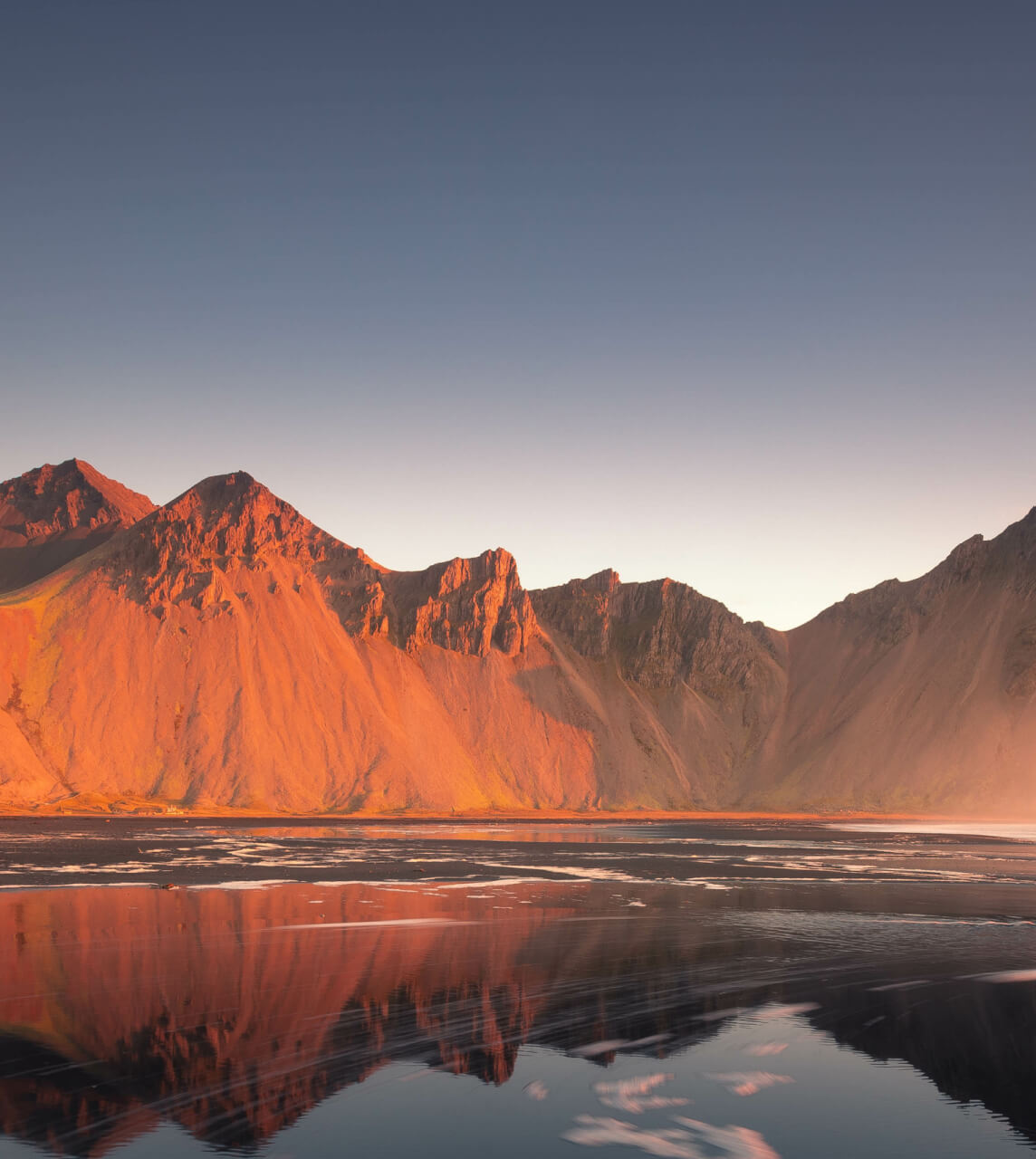 Reflection of Red Mountains