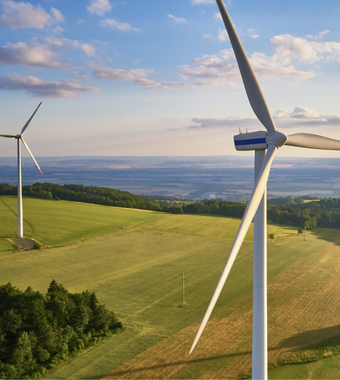Windmills Closeup view over green fields
