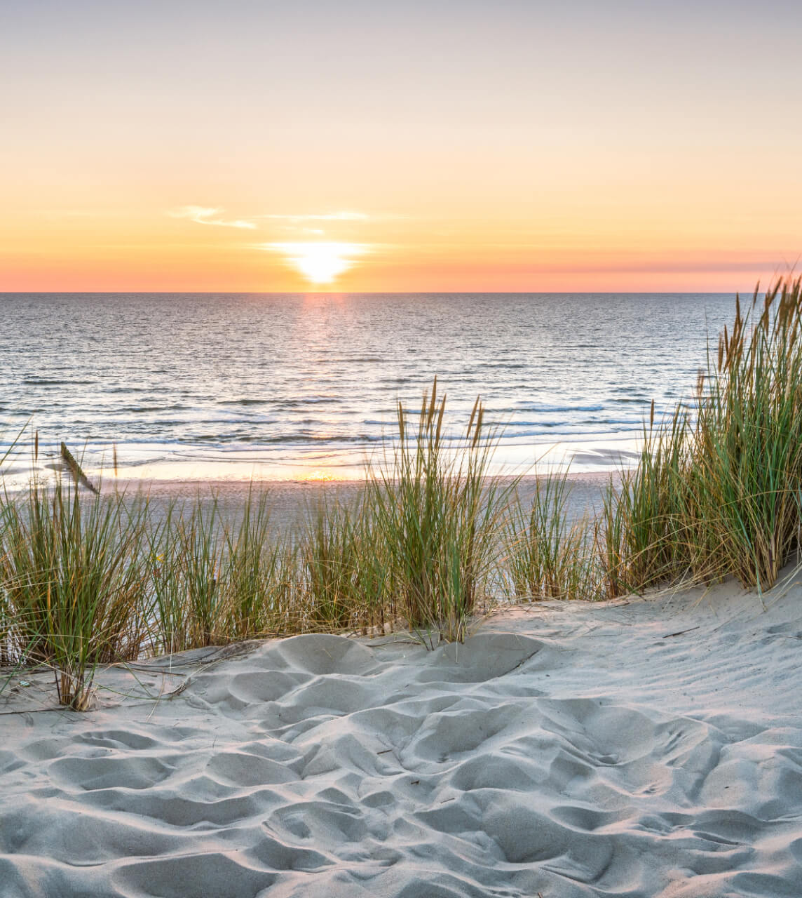 Sunset Over Ocean and Dunes